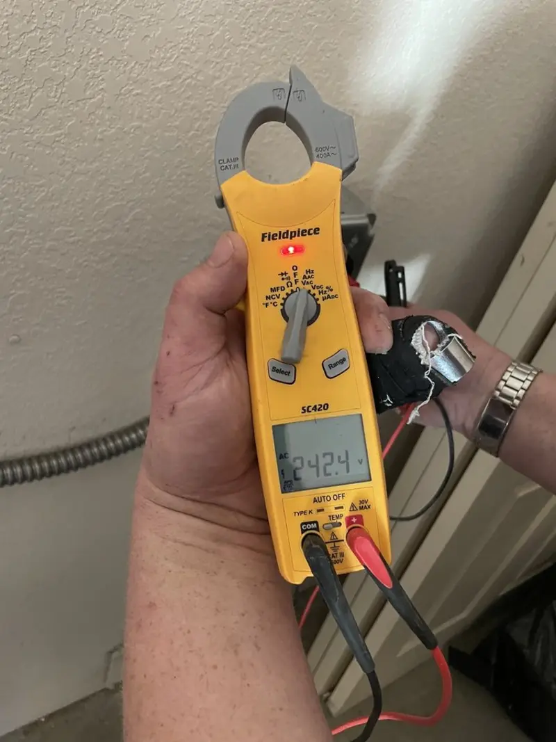 Voltage testing with clamp meter during Generator Installation in Shelby